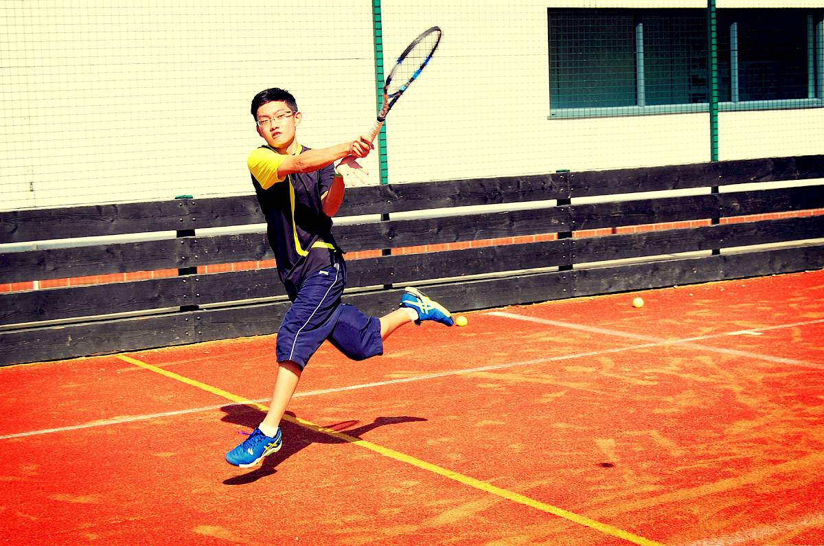 ISSFT student playing tennis