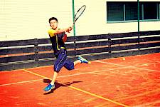 ISSFT student playing tennis