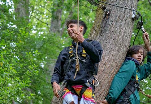 ISSFT student braving a zip slide