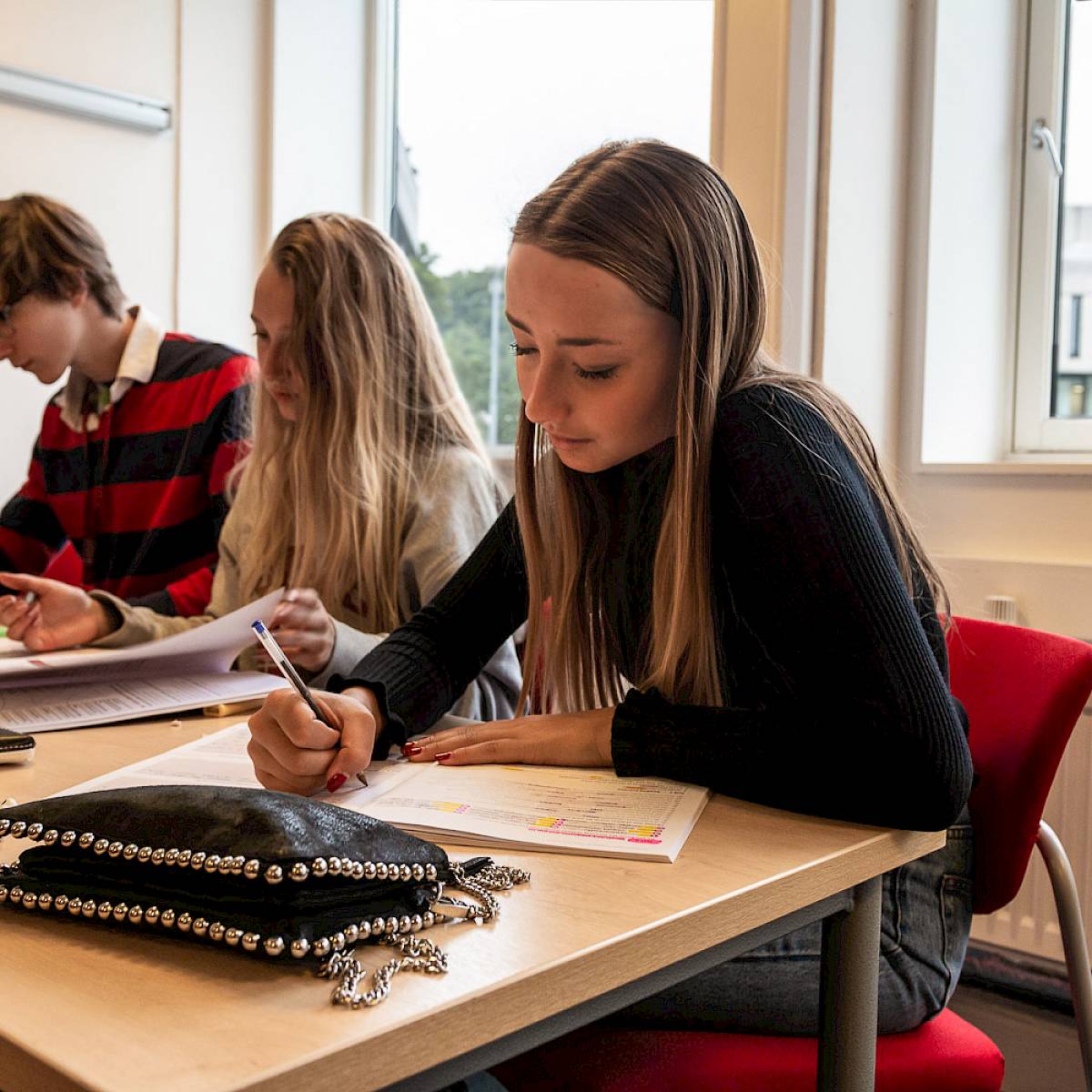 ISSFT student working at their classroom desk