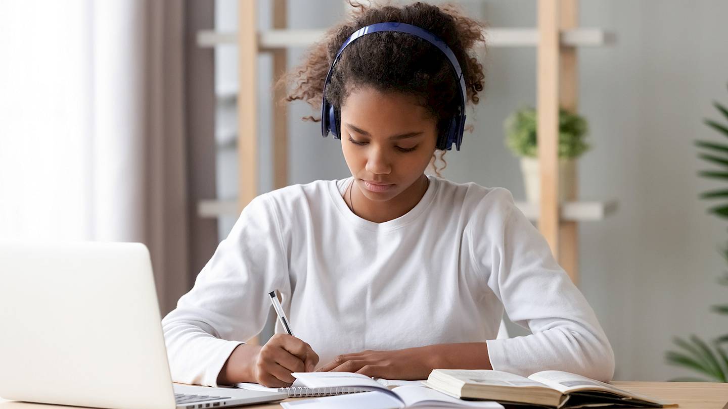 Student practicing english language writing