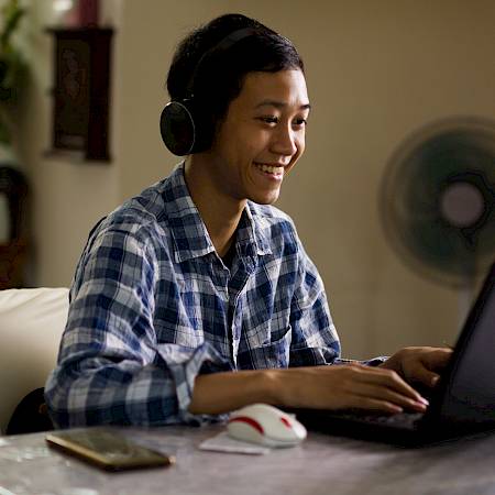 ISSFT student using their laptop from home