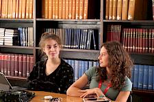 English with creative writing students sitting at desk in class