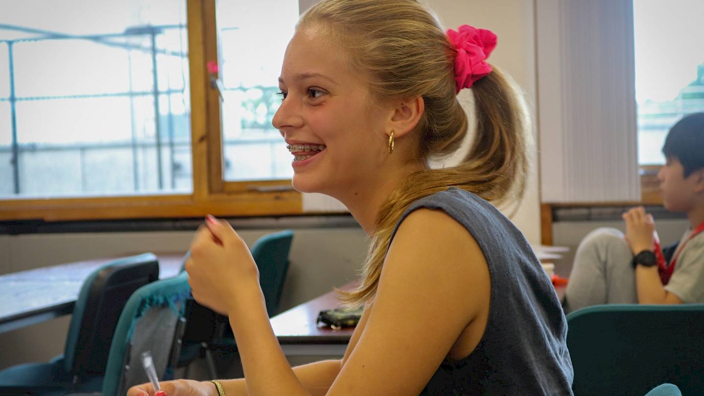 ISSFT student working at their desk during class