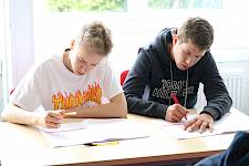 ISSFT students working at their desk during class