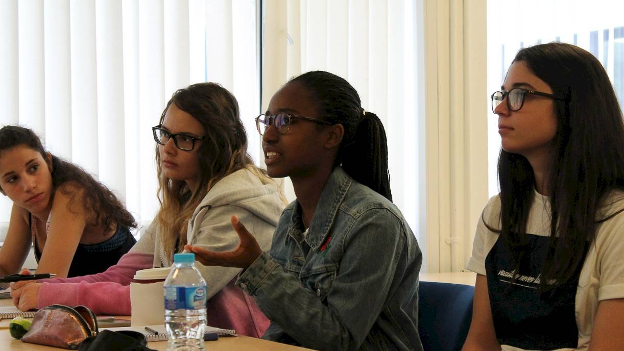 ISSFT students discussing work during class