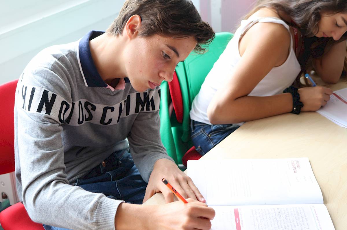 ISSFT student working at a table