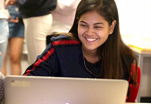 Young female woking on her laptop